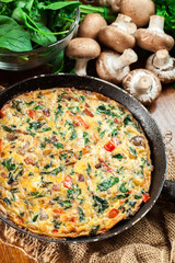 Frittata made of eggs, mushrooms and spinach