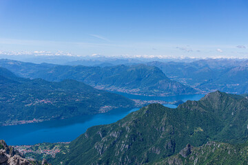Fototapeta na wymiar The view of Lake Como during a spring hike in the Alps near the town of Lecco, Lombardy, Italy - May 2020