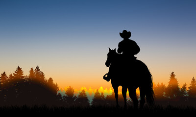 Cowboy on a horse at sunset