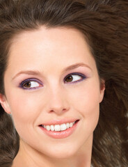 Obraz premium Young brunette Woman Smiling with purple eye make up