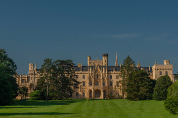 Fototapeta premium Lednice castle with fresh color spring garden in sunny morning