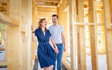 Couple make their dreams of building their own home come true visiting house under construction
