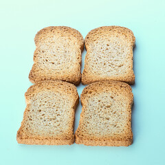 Four toast isolated on blue bakcground.