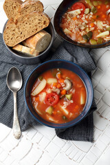Vegan tomato soup with barley, oyster mushrooms, potatoes, carrots, onions and pickles