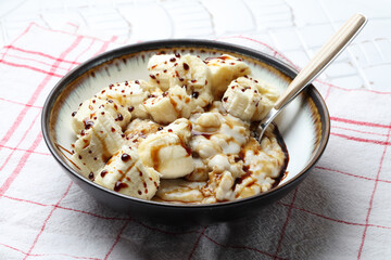 Oatmeal porridge with bananas and date syrup