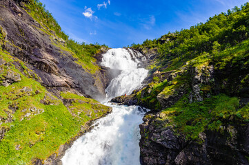 It's Kjosfossen, incredible waterfall of Norway. And the beautiful legendary Huldra dances.