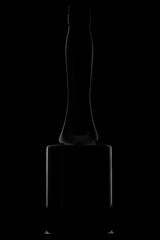 unusual interesting glass bottle isolated on a black background. Light outline on a black background.