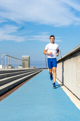 Young man running, motivation concept