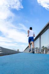 Young man running, motivation concept