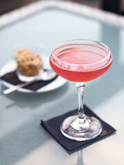 Alcohol cocktail Cosmopolitan in the bar 