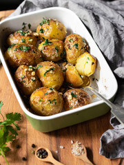 Baked potato with herbals and nuts 
