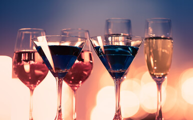 Assortment of alcoholic drinks on bar table 