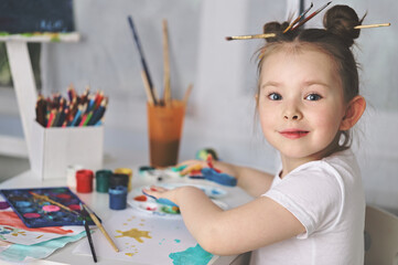 Young talented girl artist painter. High quality photo