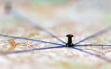The black pin marks a location on a map with routes