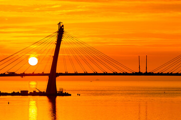 Obraz premium Bridge on the Sunset over the sea in Russia