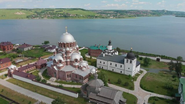 A town-island Sviyazhsk in Russia surrounded by the river - religious objects placed on the island