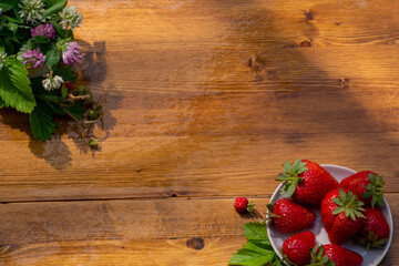 fresh strawberries on wooden background