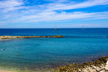 It's Beach of Antibes, Cote d'Azur, France. Antibes was founded as a 5th-century BC Greek colony and was called Antipolis