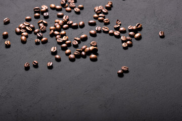 Coffee beans texture. Coffee in beans on dark background. Food background of coffee beans. Abstract background texture. Texture coffee.