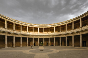 Obraz premium storm clouds on the Charles V Palace in alhambra granada spain