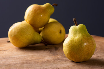 .Pears. Some pears together on wooden background