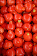 Fresh ripe red tomatoes background