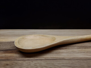 wooden spoon on wooden table