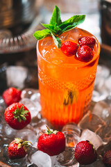 Berry cocktail on the tray. close-up of a cold cocktail.