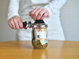 Saving Euro Money In Glass Jar