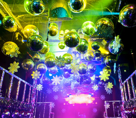 Colorful lights and disco balls decorations for Christmas at nightclub