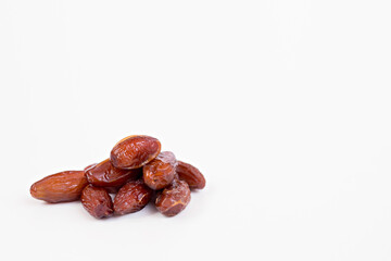 Dried dates (isolated on white background). Copy space. View from above