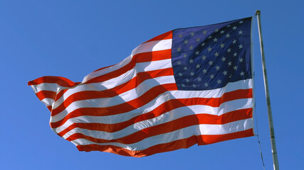 USA flag on flagpole. American dream