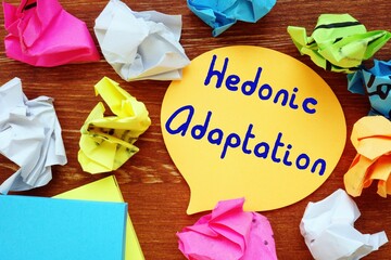 Hedonic Adaptation sign on the sheet.