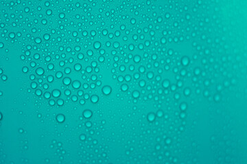 drops of pod on frosted glass