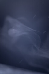 white smoke on a black background