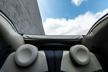 sunroof car from inside with sky