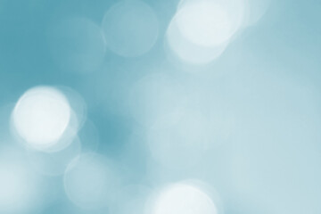 Abstract blue bokeh background. Defocused pattern for advertising, newspaper, magazine design. Universal. Star, azure, light, shiny, white, brightly.