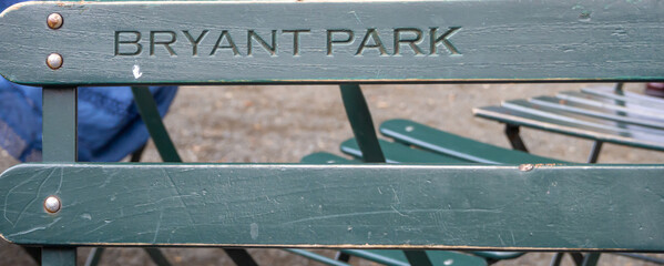 seat with park name in  Bryant Park Manhattan, New York City