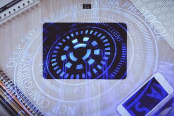 Multi exposure of technology theme drawing over work table desktop. Top view. Global data analysis concept.
