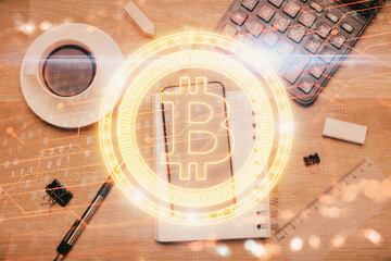 Double exposure of blockchain theme hologram over table with phone. Top view. Crypto technology concept.