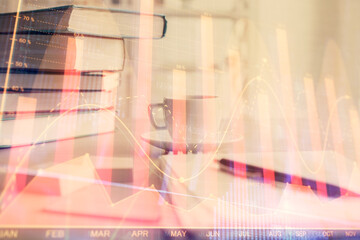 Double exposure of financial chart drawing and desktop with coffee and items on table background. Concept of forex market trading