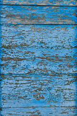 blue wall from vertically and horizontally laid boards