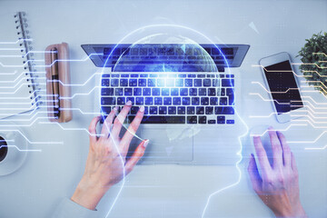 Double exposure of woman working on computer andhuman brain hologram drawing. Top View. Ai concept.