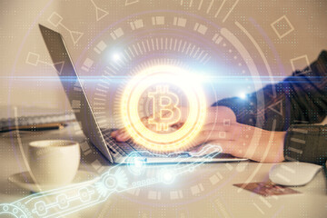 Obraz premium Double exposure of woman hands typing on computer and crypto market theme hologram drawing. Blockchain concept.