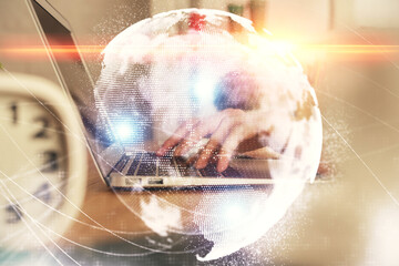 Double exposure of woman hands typing on computer and business theme hologram drawing. Success...
