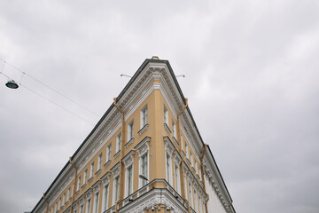 A building with  a very acute angle corner. Classic style european architecture .