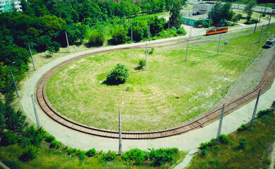 Tram depot where there are trams. Trams on the territory of the tram electric depot. Aerial drone view.