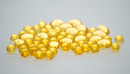 Transparent fish oil on the background. Background is not isolated