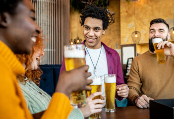 Group of friends drinking beer and talking