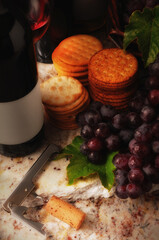 Wine Still life with corkscrew and crackers